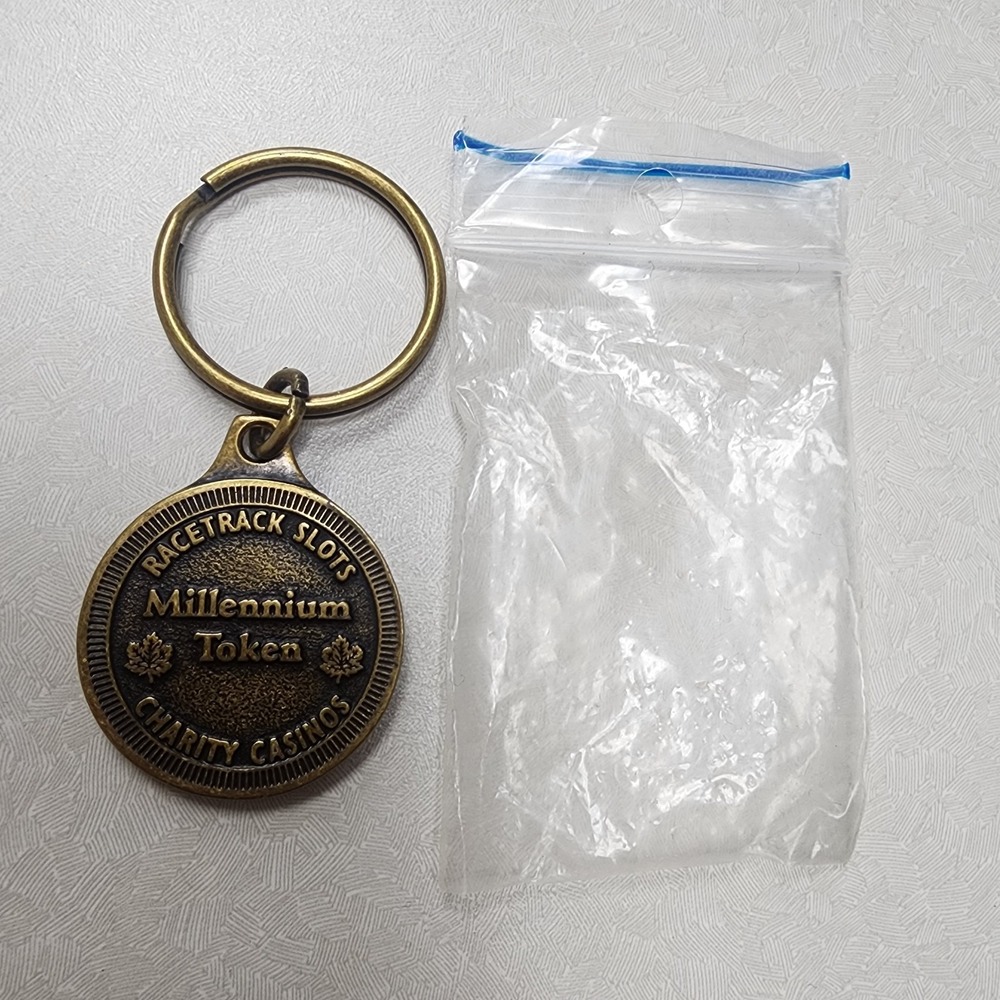 Ontario Lottery Corp 2000 Millennium Token Keyring Charity Casino Racetrack Slot